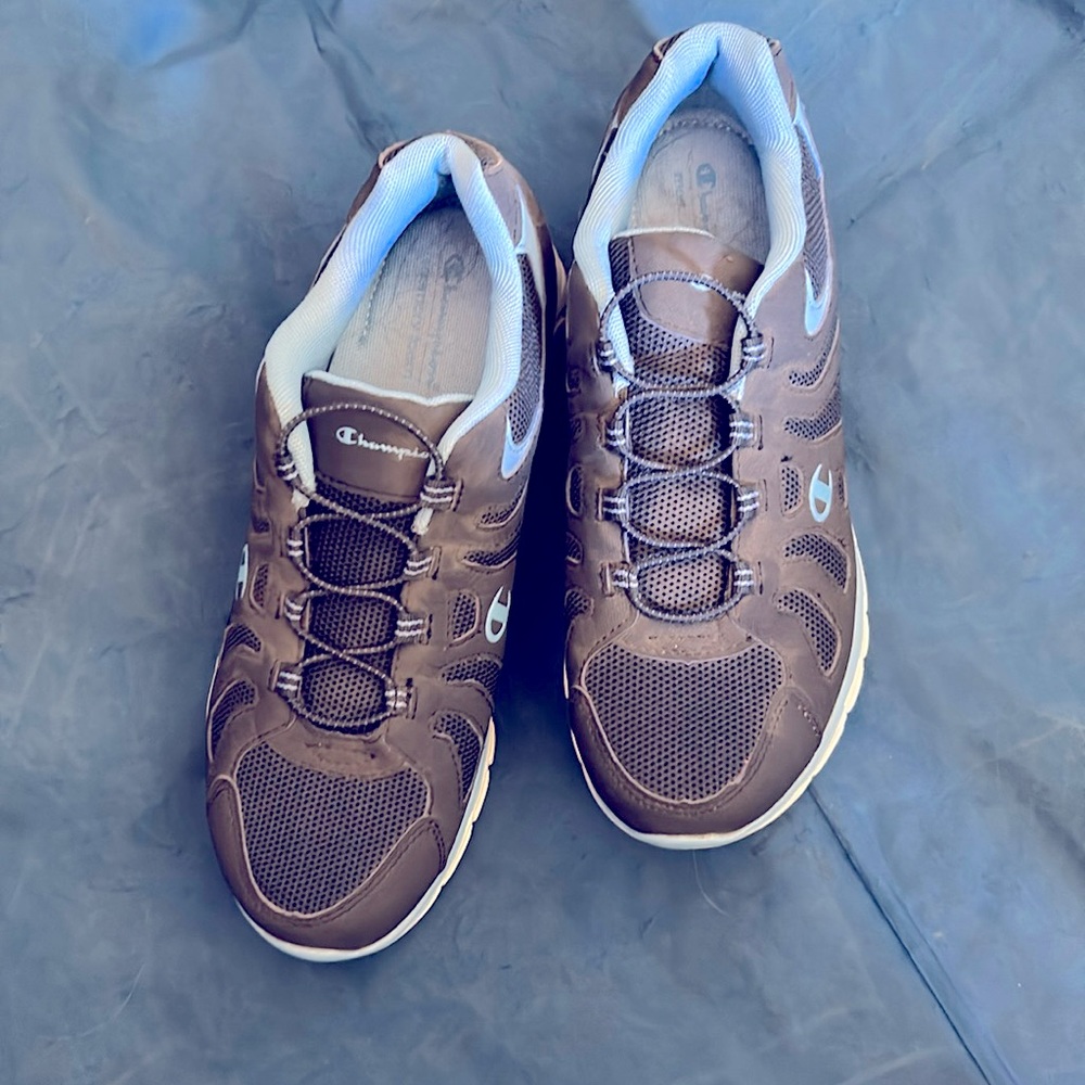 Champion tennis shoes step in